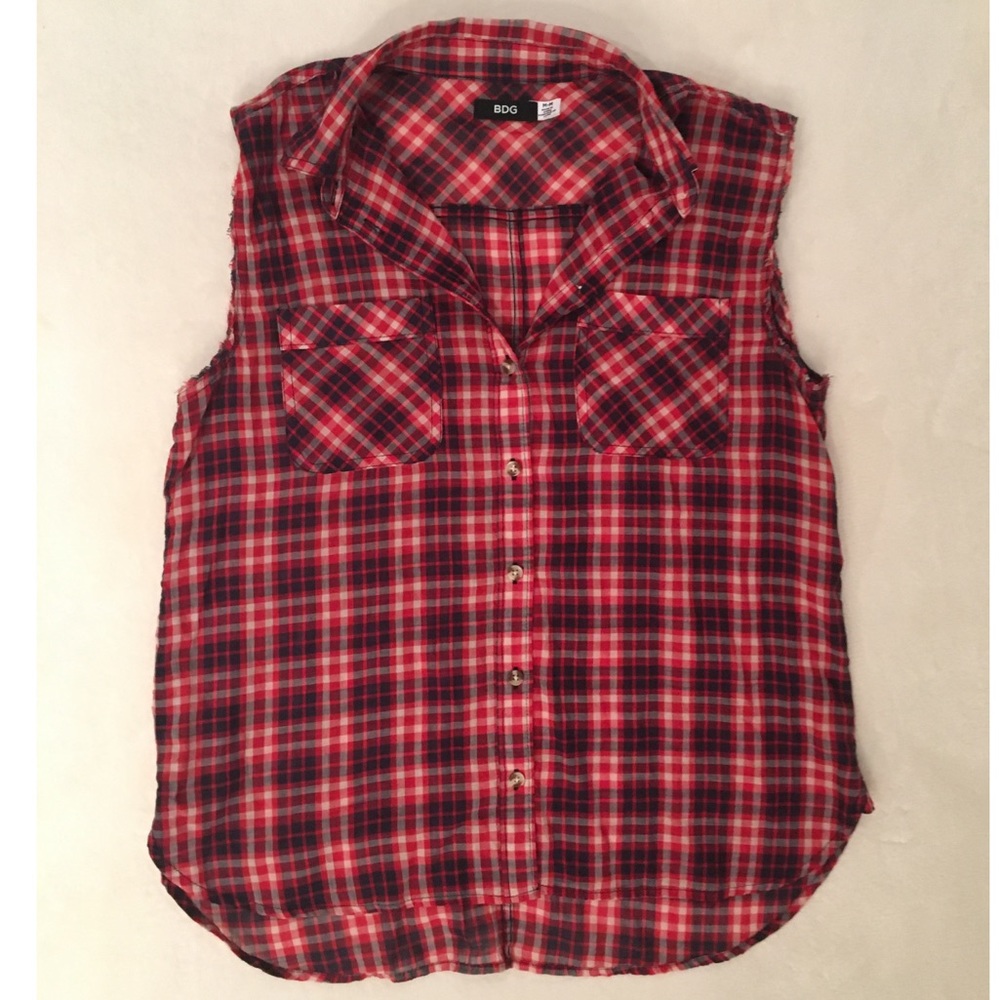 Button down plaid top w/ distressed arm cut.